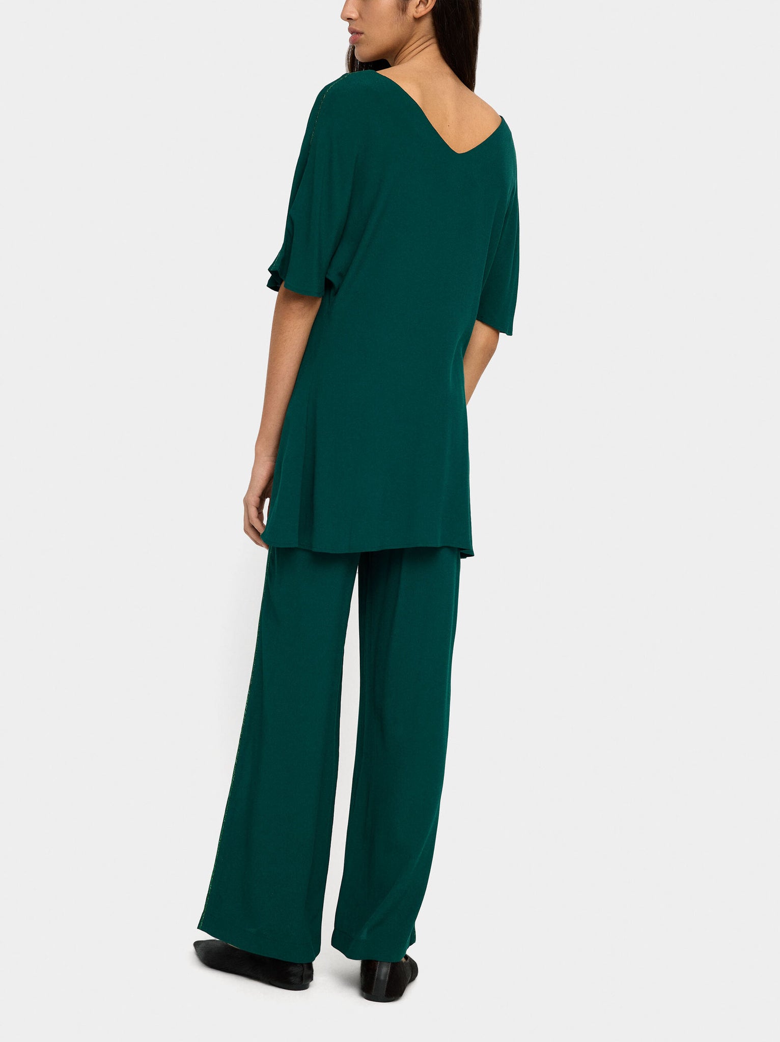 Blusa larga detalle brillante