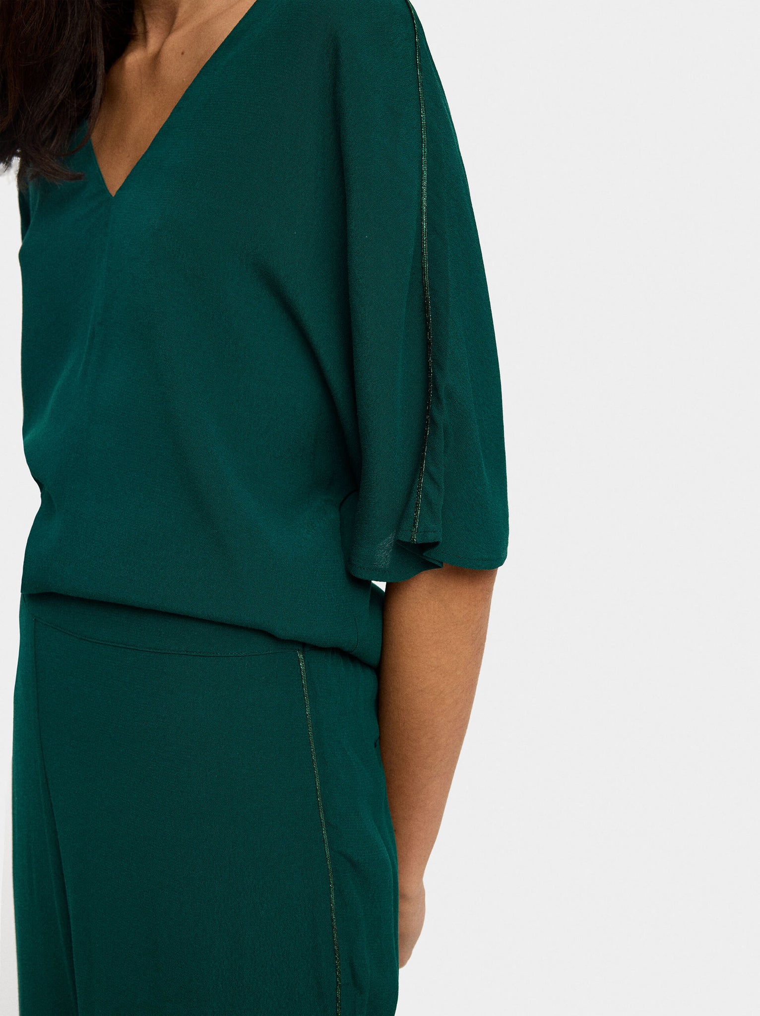 Blusa larga detalle brillante