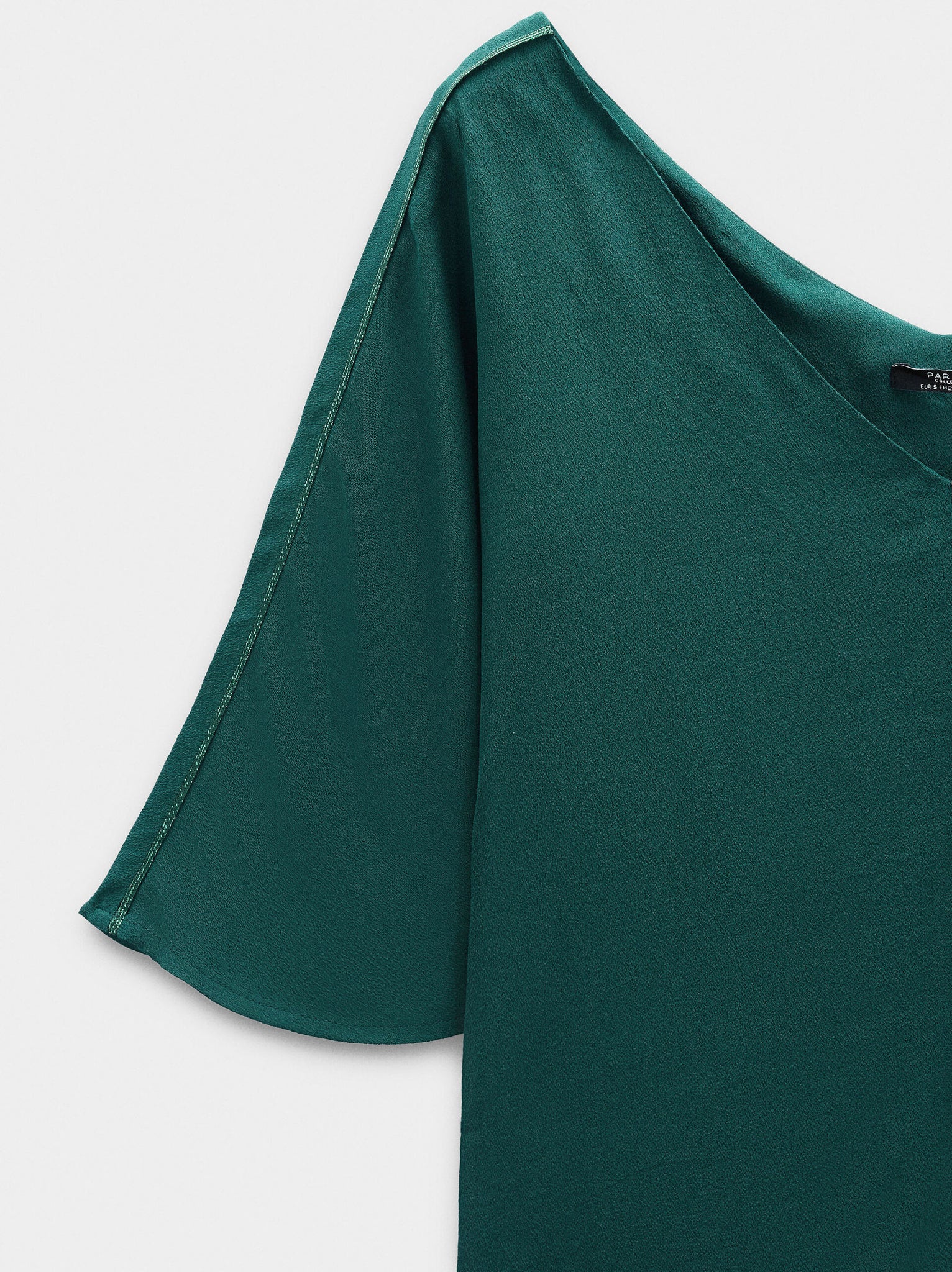 Blusa larga detalle brillante