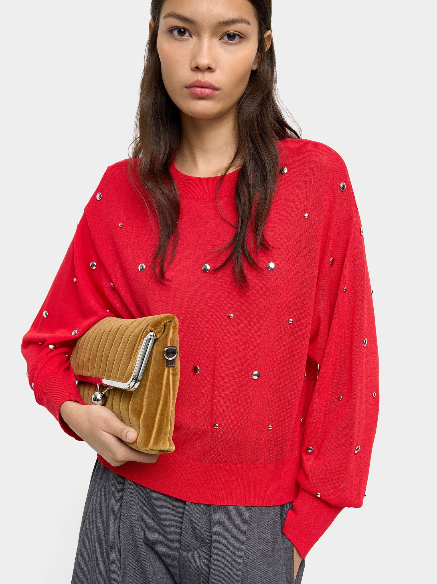 Jersey de punto con tachuelas