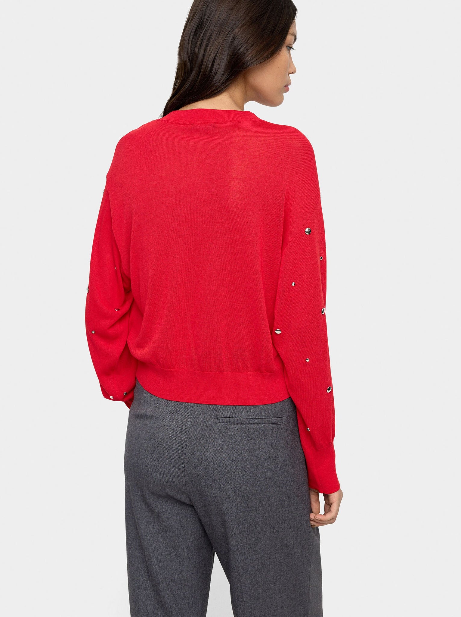 Jersey de punto con tachuelas